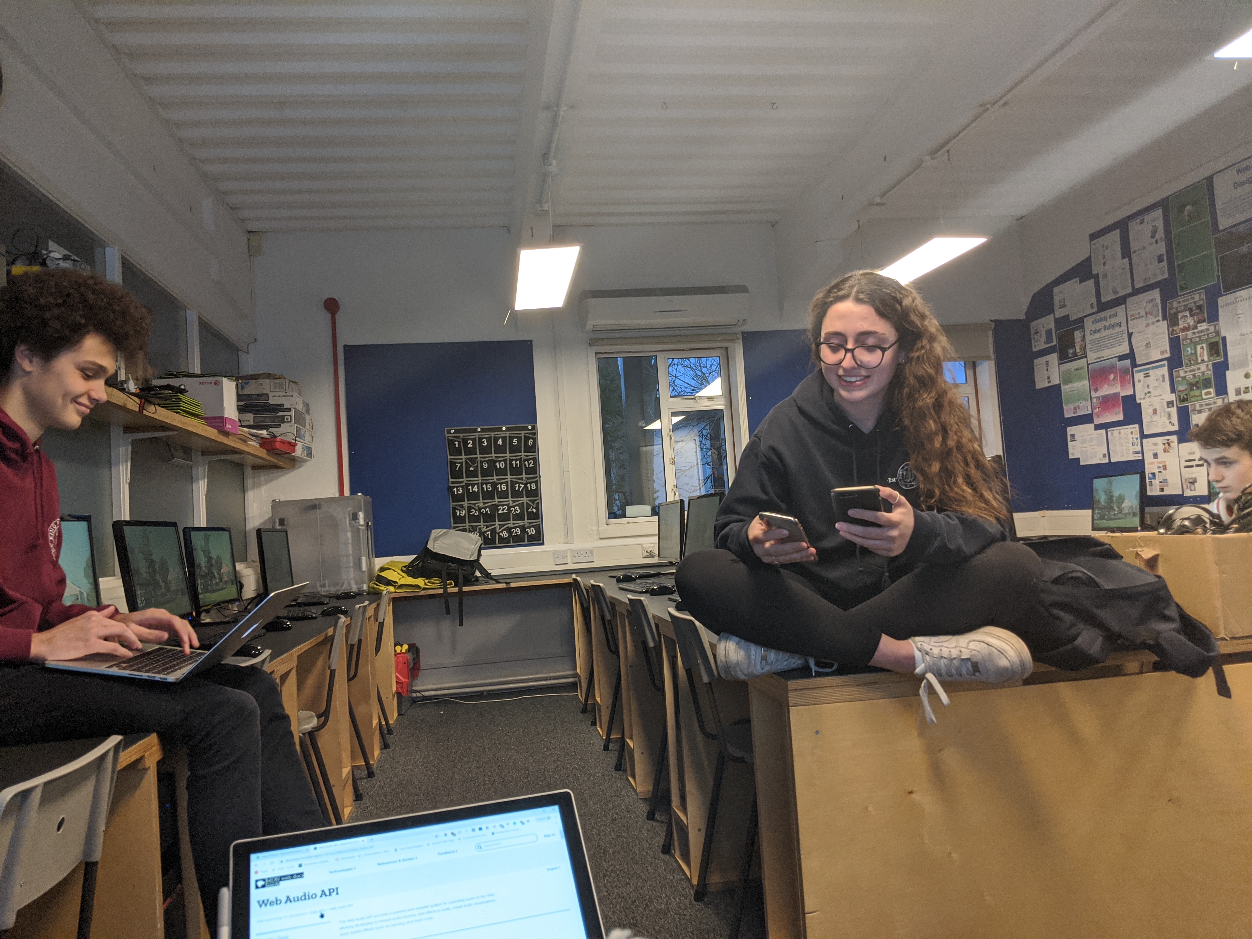 Felix on the left, then two Hack Club members to the right.